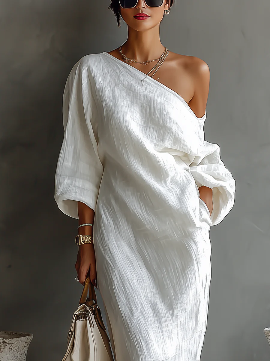 "Nelle™ - Elegancka Sukienka Maxi" can be rewritten as "Nelle™ - Stylowa Maxi Sukienka".