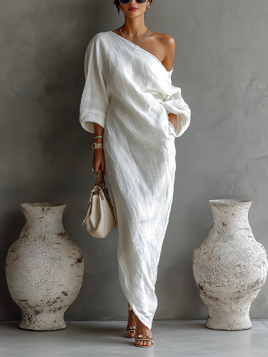 "Nelle™ - Elegancka Sukienka Maxi" can be rewritten as "Nelle™ - Stylowa Maxi Sukienka".