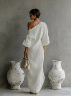 "Nelle™ - Elegancka Sukienka Maxi" can be rewritten as "Nelle™ - Stylowa Maxi Sukienka".